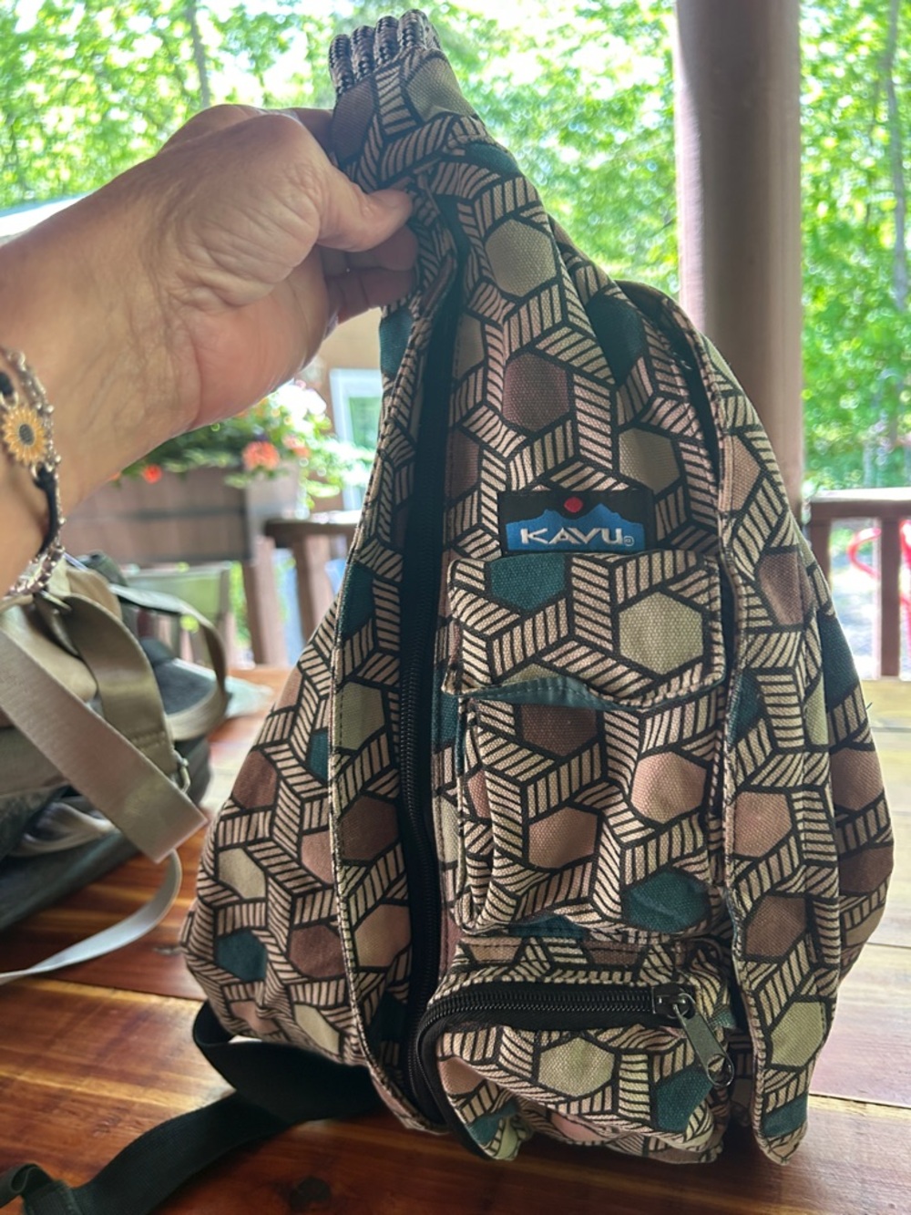 Kavu Geometric Pattern Sling Backpack in Teal, Brown, Cream